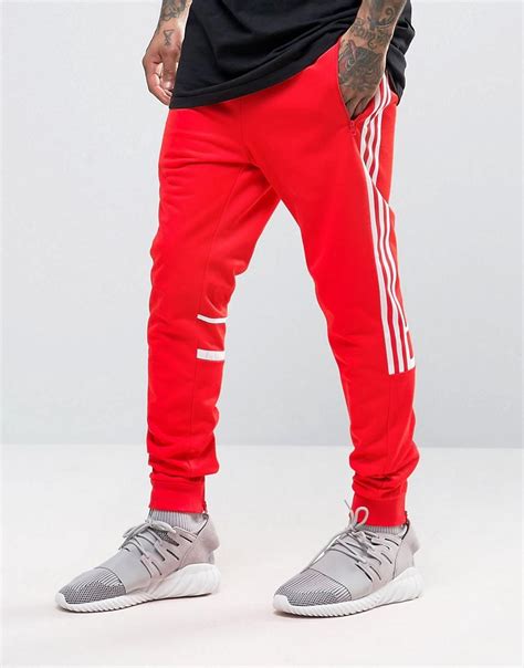 red adidas original joggers|adidas fleece joggers men's.